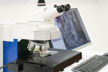 Microscope in laboratory. Industrial Microscope for industry. Medical and Chemical equipment in laboratory.