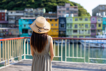 Canvas Print - Tourist woman go Keelung Zhengbin bay in Taiwan