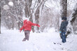 © alexkich - Kids walk in the park first snow