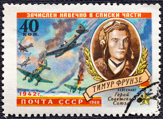 Wall Mural - USSR - CIRCA 1960: A stamp printed in USSR shows Planes in Combat and Timur Frunze 1923-1942 , a World War II hero.