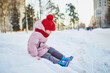 © Ekaterina Pokrovsky - Adorable preschooler girl having fun in beautiful winter park on a snowy cold winter day