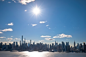 Wall Mural - New York City epic skyline under bright sky view