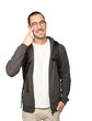 © agongallud - Friendly student making a gesture of being careful with his hand pointing at his eye