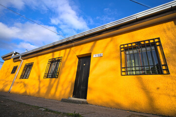 Wall Mural - yellow house in the city of the country, Talca, Chile