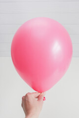 Wall Mural - pink latex balloon isolated on white background