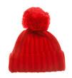 Red knitted winter bobble hat of traditional design isolated on white background. Handmade woolly cap with pompom on top