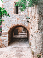 Street scene with arched tunnel in Monemvasia, Greece