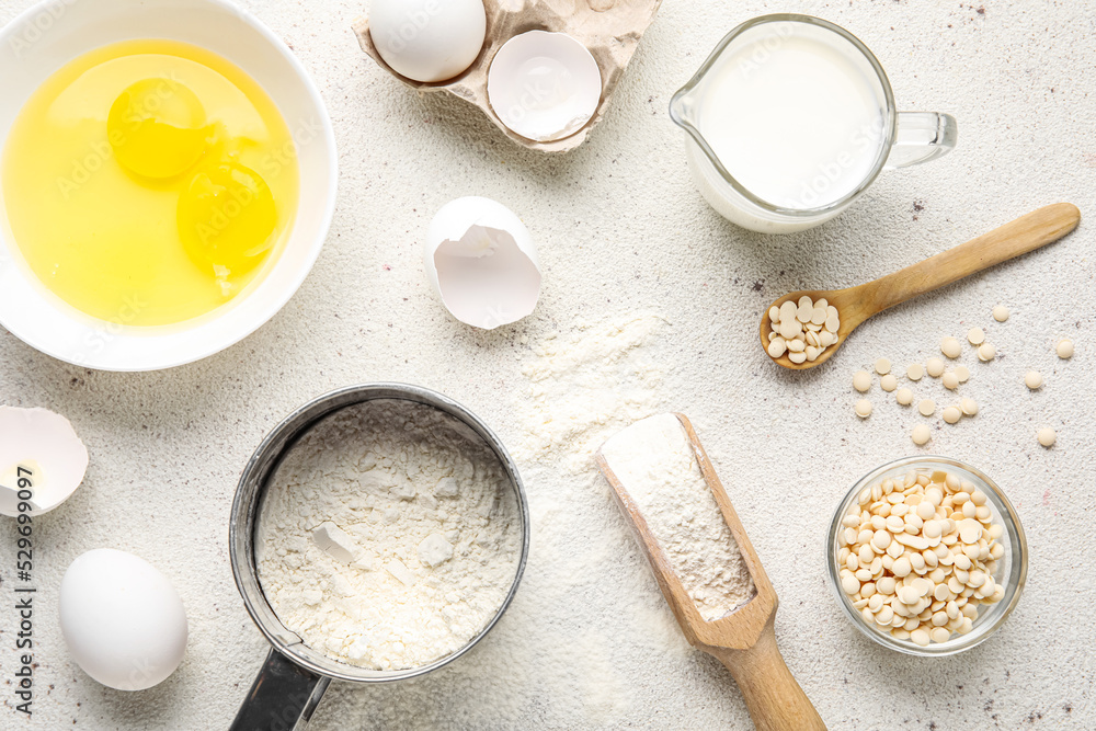 Composition with different ingredients for baking on light background