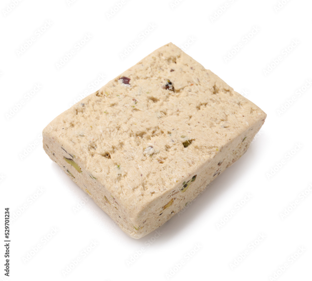 Piece of tasty sesame halva on white background