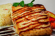 Grilled fish drizzled with balsamic glaze