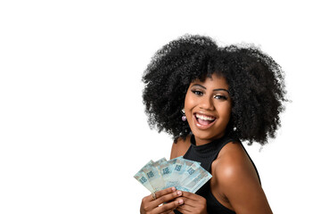  woman smiling holding brazilian money bills, positively surprised, space for text, person, advertising concept	