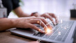 © FAMILY STOCK - Woman use Laptop with cloud computing diagram show on hand. Cloud technology. Data storage. Networking and internet service concept.
