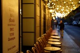 Fototapeta Miasto - Outside terrace of a bistro in Paris, France in the evening