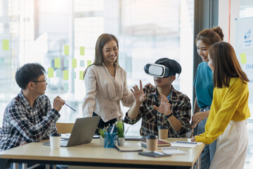 Startup colleagues brainstorm together to discuss innovation projects.