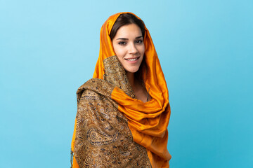 Sticker - Young Moroccan woman with traditional costume isolated on blue background