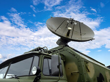 Satellite Dish On Military Vehicle. Locator For Military Intelligence. Satellite Dish For Radio Intelligence. Interception Signals. Military Vehicle With Locator. Locator For Intercepting Radio Signal