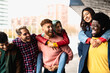 © Alessandro Biascioli - Young multi ethnic friends having fun together hanging out in the city - Friendship and diversity concept