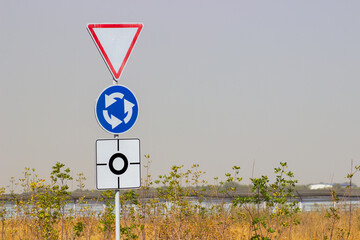 Wall Mural - traffic direction sign white circle arrow on blue background