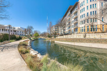 Small River In The Middle Of Mid-rise Resiedntial Buildings At San Antonio, TX