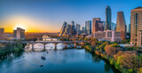 Fototapeta Mapy - Austin, Texas- Cityscape with Colorado River in the middle against the sunset sky