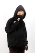 © Purnomo - a boy poses styles wearing a black hoodie with a white background