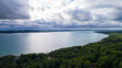 Aerial drone view of Torch Lake on overcast summer day. 