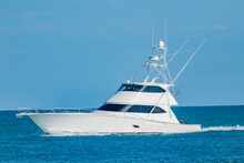 A Sportfish Motor Yacht Heads Out To Sea For A Fishing Trip