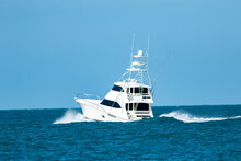 A Sportfish Motor Yacht Heads Out To Sea For A Fishing Trip