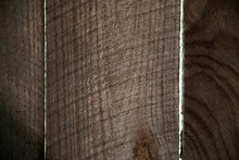 Close Up Of Rough Sawn Fence Boards With Gaps Between The Boards, Wood Grain Texture