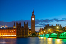 Big Ben, Palace Of Westminster And Westminster Bridge At Sunset Blue Hour At Night In London, England, UK. Big Ben And Palace Is World Heritage Site Since 1970. 