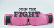 Image of join the fight over moving purple circles and pink boxing gloves