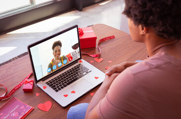 Poster - African american young couple dating on video call on valentine day