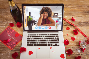 Sticker - Happy biracial young woman during online dating through laptop on valentine day