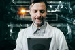 © sata_production - Engineer with tablet working at polymer factory