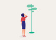 © simplehappyart - One Young Woman In Businesswear Scratching Head And Standing Beside Road Sign Undecided Which Direction To Choose. Full Length. Flat Design Style, Character, Cartoon.