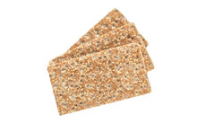 Stack of wholegrain dry crispy bread with sesame isolated on a transparent background.
