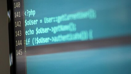 Wall Mural - typing php-code on screen by web developer and php developer shows computer screen with source code 