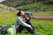 © Antonioguillem - Hiker drinking water from canteen in a mountain