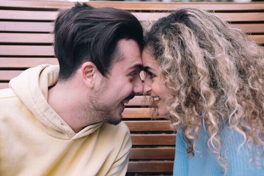 Happy young couple staring into each other's eyes