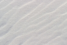 Wavy White Sand Closeup Used As Background