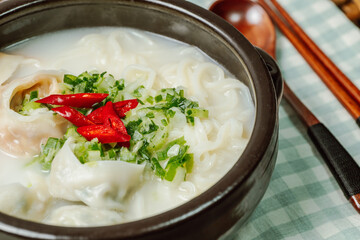 Wall Mural - Korean style noodle soup with dumplings, mandu kalguksu