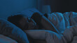 © golubovy - Night sleep. Relaxed woman. Bedtime rest. Tired lady with closed eyes lying in bed in dark home interior.