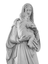 Ancient Statue Of The Mother Vigin Mary Carrying The Baby Jesus Isolated On White Background With Clipping Path. Religion Sculpture