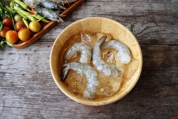 Canvas Print - Fresh shrimp raw seafood on wood background