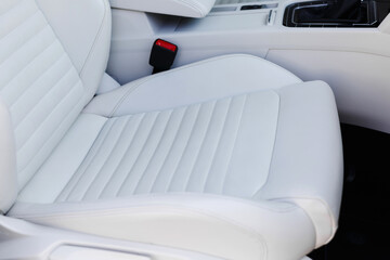 Wall Mural - Details of white leather seat in a luxury car.