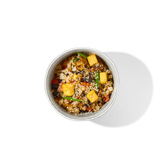 Canvas Print - Vegetarian fried rice with vegetables and tofu cheese isolated on white background. Traditional chinese food - fried rice with egg in ceramic bowl Vegan bowl with rice and tofu on white background