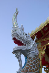 Wall Mural - Naga statue in northern Thai temple