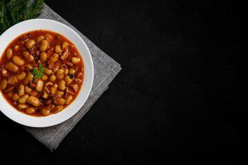 Wall Mural - Tasty polish white baked beans and sausage in tomato sauce