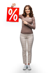 Poster - sale and business concept - happy female shop assistant or saleswoman holding shopping bag with percentage sign over white background