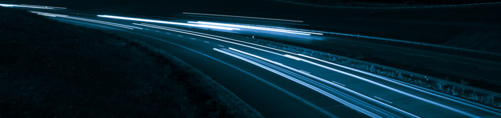 Wall Mural - blue car lights at night. long exposure